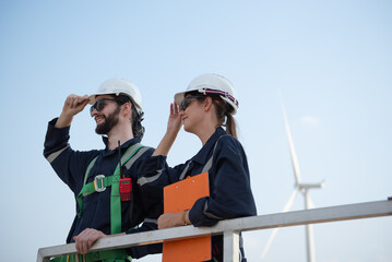 Wind Turbine Maintenance and Repair Technician, Engineer Checking Turbines working maintenance clean power generator system