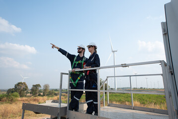 Wind Turbine Maintenance and Repair Technician, Engineer Checking Turbines working maintenance clean power generator system