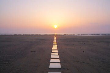 A serene beach pathway leading to a golden sunset over the tranquil ocean horizon view