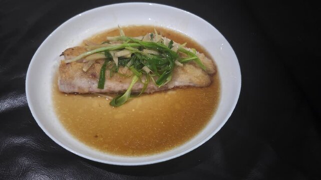 chicken noodle soup,Tim Ikan,Steamed snapper fish with soybean sauce in a plate,Fish in soysauce