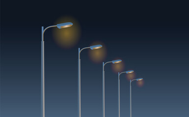 Streetlights illuminate the evening sky in a peaceful and serene urban landscape.