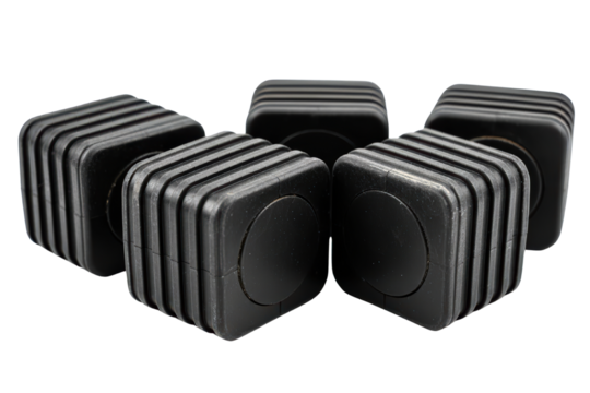 Set of five square black rubber feet for furniture or electronics isolated on a transparent background