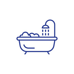 Relaxing bubble bath with shower head ready for a spa day escape in a modern bathroom design, perfect for promoting self care and wellness moments