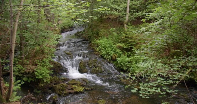 Wide shot of a small waterfall on Dess burn