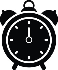 Classic alarm clock with minute hand pointing to twelve and hour hand hidden