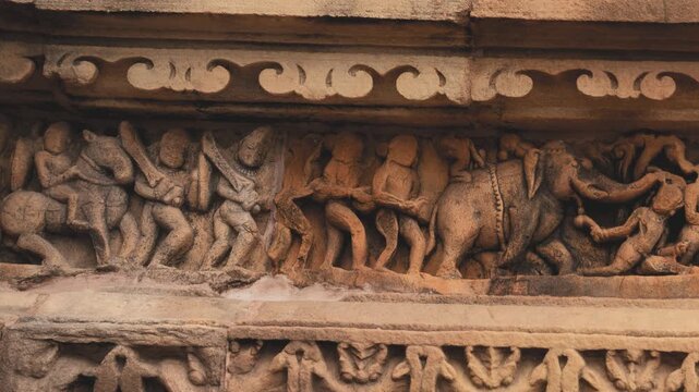 Beautiful stone sculptures at the temple, within the Khajuraho Group of Monuments in the Chhatarpur district, Madhya Pradesh, India, Asia its an a UNESCO World Heritage Site.