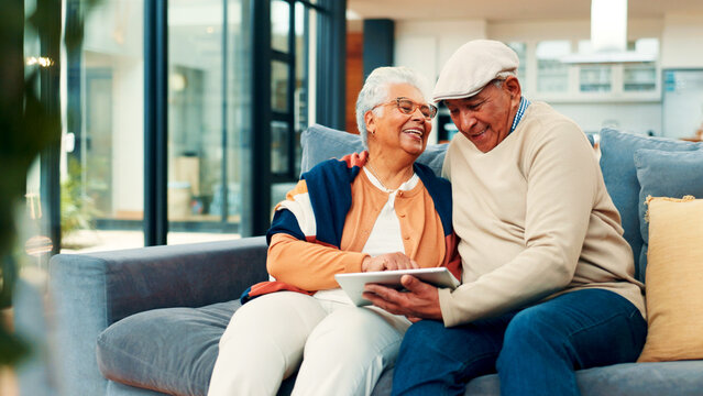 Sofa, home and senior couple on tablet for online streaming, internet subscription and bonding. Retirement, marriage and mature man and woman on digital tech for videos, watching movie and relax - Powered by Adobe