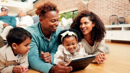 Parents, children and tablet on floor, happy and bonding with care, love and online game in family house. People, mother and father with kids, tech and application for learning in living room at home