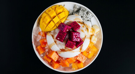 "Refreshing Es Buah Segar: Colorful Indonesian Fruit Salad with Shaved Ice and Sweet Syrup"