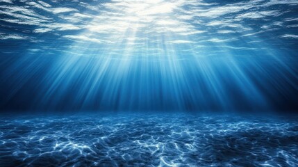 Sunlight Streams Through Clear Blue Water to Ocean Floor