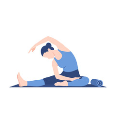 A woman in blue sportswear is performing a seated yoga stretch on a mat with a rolled towel nearby.