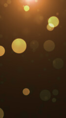 Soft glowing golden bokeh lights floating on a dark background with a warm dreamy atmosphere