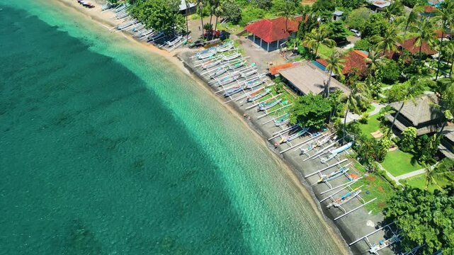 Aerial View Of Amed Beach And Bunutan Boat Pier With Clear Turquoise Water