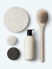 A collection of spa and bath accessories, including a pumice stone, loofah, soap, lotion dispenser, and body brush, are arranged on a white background.
