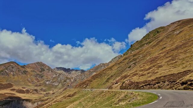 Driving up the Col du Tourmalet steep road, located in the center of the Pyrenees chain, in the Hautes-Pyrenees department in France, highest mountain pass in Pyrennes, famous Tour de France climb