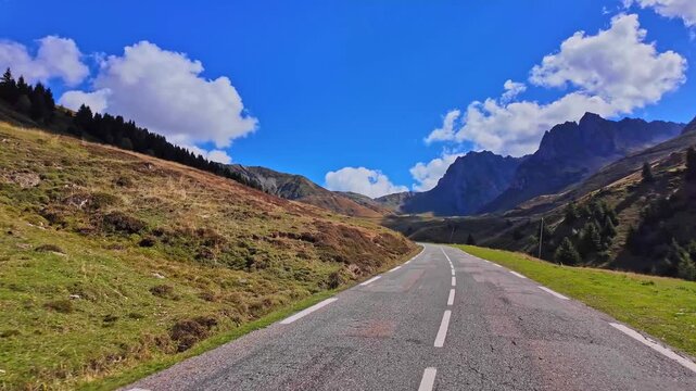 Driving up the Col du Tourmalet steep road, located in the center of the Pyrenees chain, in the Hautes-Pyrenees department in France, highest mountain pass in Pyrennes, famous Tour de France climb