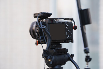 Camera setup on tripod for outdoor shooting session