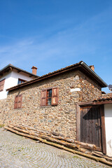 Architectural structures with stone walls. Historic houses in Birgi Village, Ödemiş, Izmir. Historic stone houses in Birgi Village. Türkiye.
