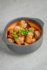 Tender eggplant topped with flavorful ingredients, served in a stylish bowl. Great for sharing!
