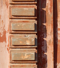 A brick wall with a shadow on it