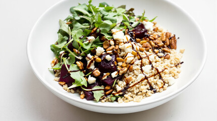 Healthy Grain Bowl with Roasted Beets Greens and Crumbled Cheese healthy eating