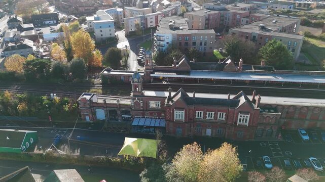 Aerial view of Bury St Edmunds near Tesco lake, showing buildings and trees