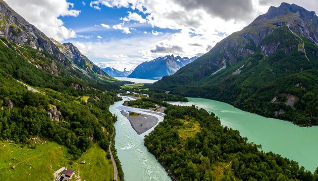 Aerial view of a vibrant valley with a river and lush green mountains - Powered by Adobe