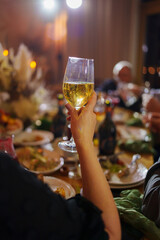 Celebration at a festive dinner with drinks and food