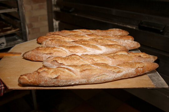 homemade baguette on a wooden board