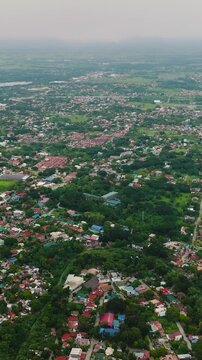 Scenic landscape of residential area in Iloilo City. Panay Island. Philippines. Vertical view.