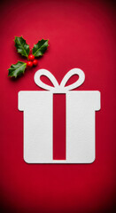 White gift box icon with holly berries on red, a velvety and festive Christmas cutout. Perfect for seasonal promotions, including Black Friday deals and holiday sales.