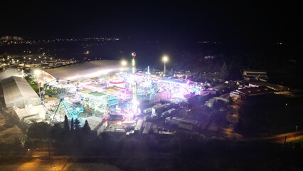 Aerial night view of illuminated amusement park in Portugal