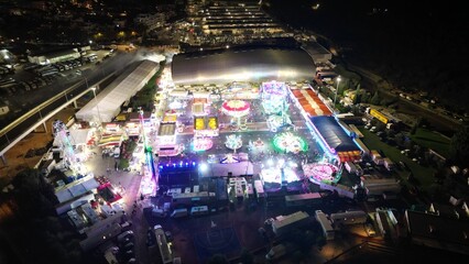 Aerial night view of illuminated amusement park in Portugal