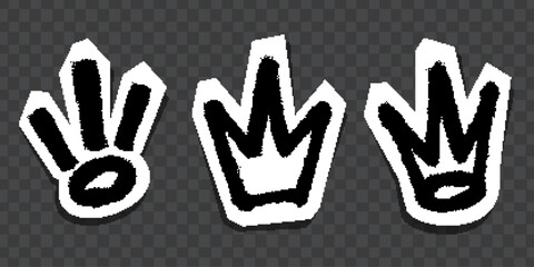 Graffiti-style black crown and symbol stickers with white outlines on dark background.