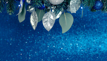 Cinematic capture of shimmering Christmas ornaments and festive blue glitter, evoking a luxurious holiday spirit with elegant winter decorations for a magical celebration