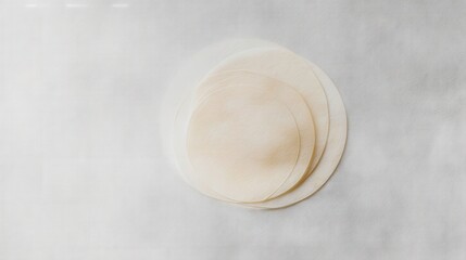 Fototapeta premium Thin round rice paper sheets on white background isolated. Generative AI