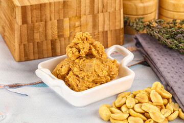 Crunchy peanut butter fat product