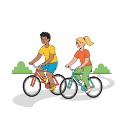 Two young adults riding bicycles together in a park 