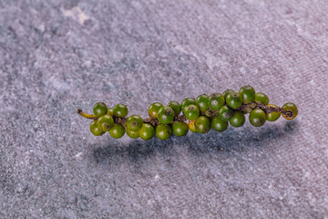 Ripe green pepper corn branch