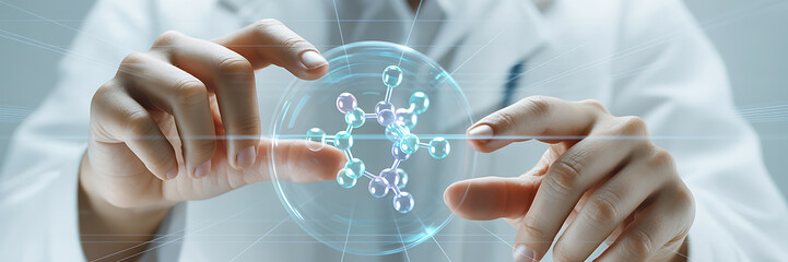 Scientist's hands manipulating a glowing molecular model sphere