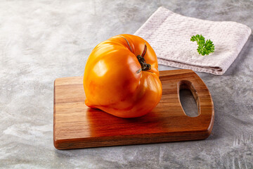 Yellow ripe juicy heart tomato