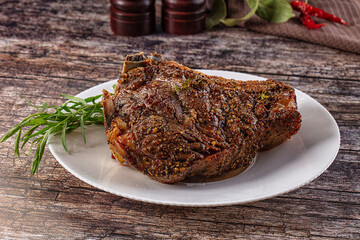 Baked beef steak on the bone