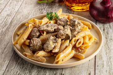 Italian pasta penne with chicken liver