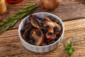 Fried champignon slices in the plate