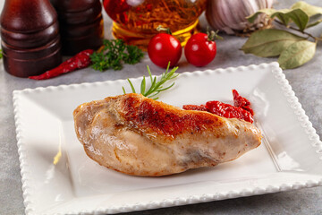 Roasted rabbit leg served rosemary