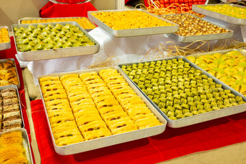Karisik Turk tatlilari. New dessert varieties at the  luxury hotel open buffet. Milk-based desserts,  Turkish Dessert Sobiyet, havuc dilimi, midye baklava, mussels baklava and classic baklava. 