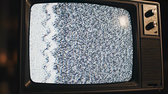 Television screen filled with tiny objects, people, or dots creating visually striking scene conveying concept of noise and static, perfectly capturing overwhelming information in todays fast.
