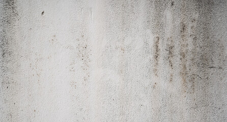 White wall texture with subtle stains, rough surface, and weathered appearance, perfect for backgrounds or design projects needing neutral, aged, and slightly dirty look