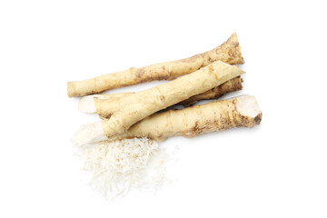 Grated horseradish and roots isolated on white, top view