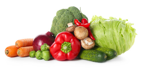 Pile of different fresh raw vegetables isolated on white